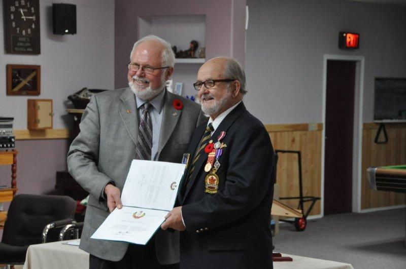 Awarding Diamond Jubilee Medal to Major Terry Lawrence   (at Russell, Nov 10 2012)